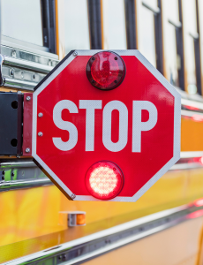 Stop sign on bus