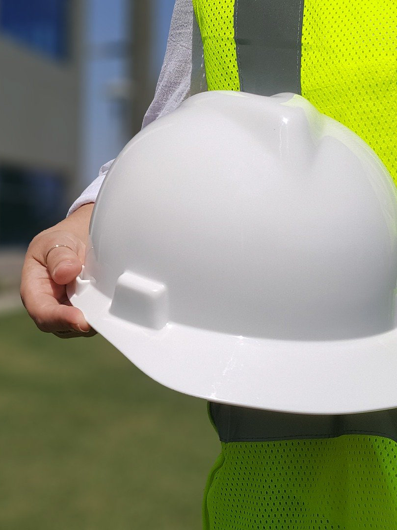 Man holding hard hat