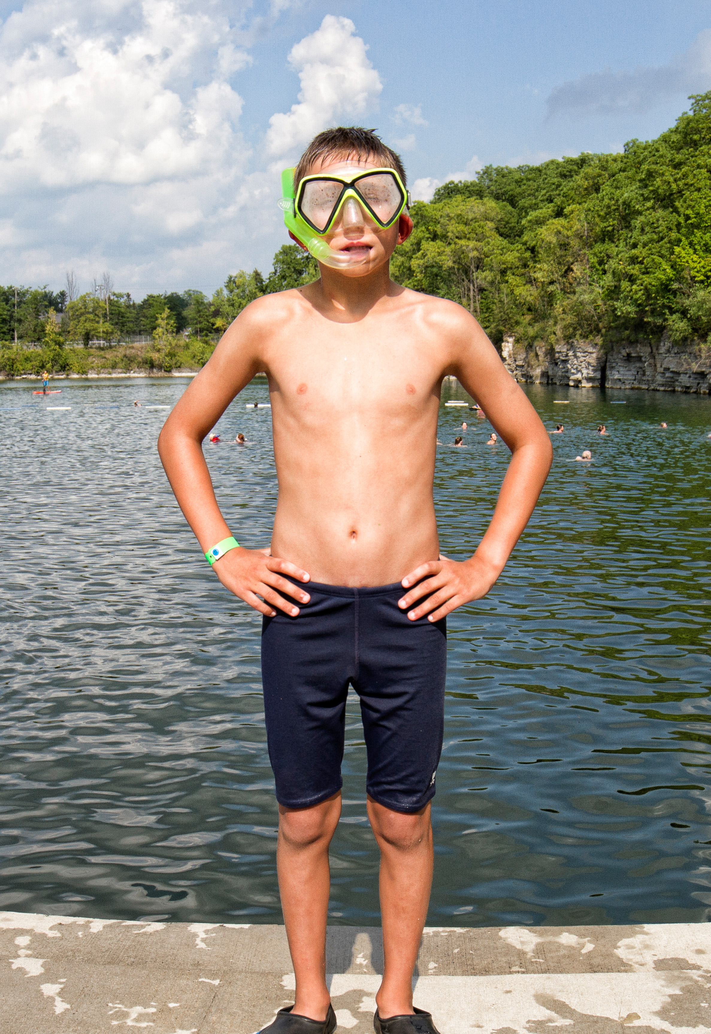 Image of a boy wearing goggles standing on the quarry deck