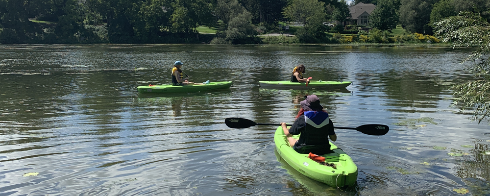 Three people kayaking