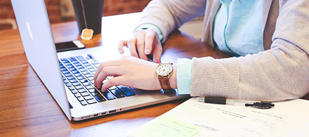 Image of woman using computer