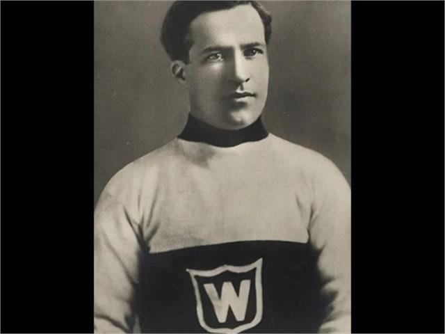 Riley Hern posing in Wanderers hockey sweater